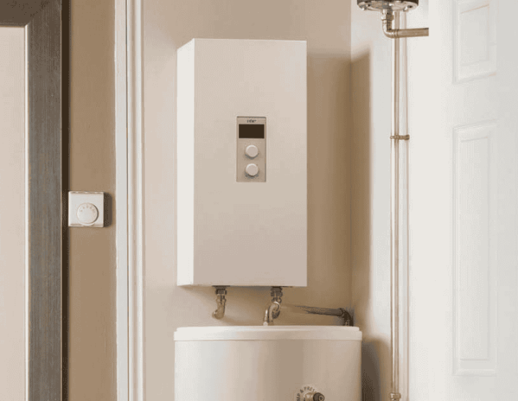 Electric water heater wall mounted above an indirect water cylinder